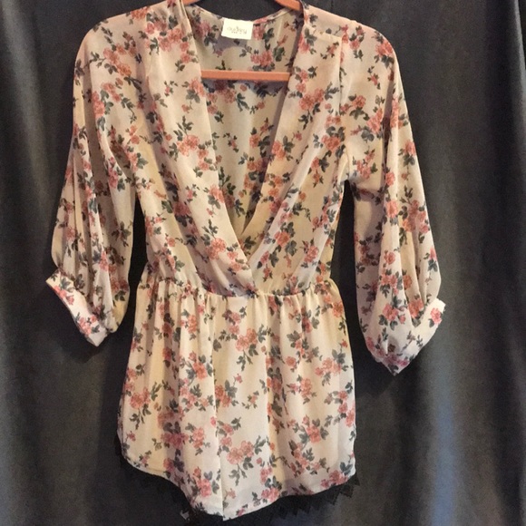 audrey Dresses & Skirts - Audrey floral plunge romper. MAKE OFFERS